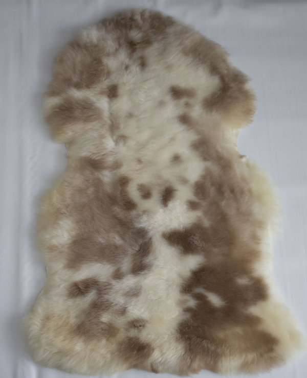 Natuurlijke schapenvacht lichtbruin/wit (100x60cm)